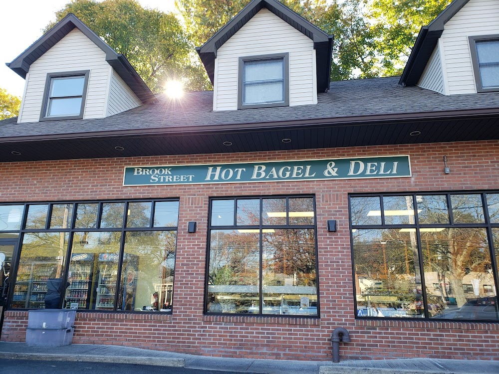 Brook Street storefront with its green bagel and deli sign